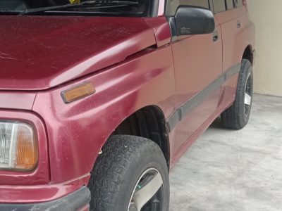 Suzuki sidekick solo